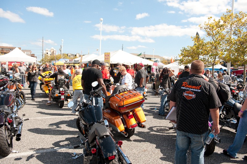event attendees admiring motorcycles in OC Convention Center parking lot