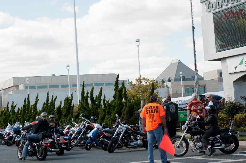 event staff directing motorcylce traffic at OC Convention Center